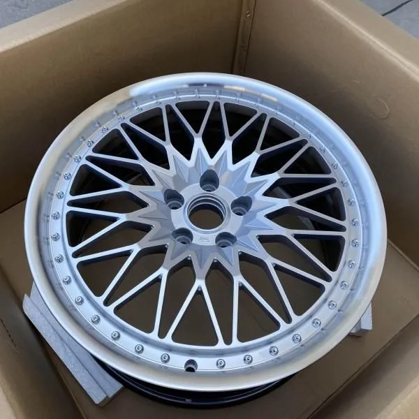 Monoblock with big lip and decorative bolts